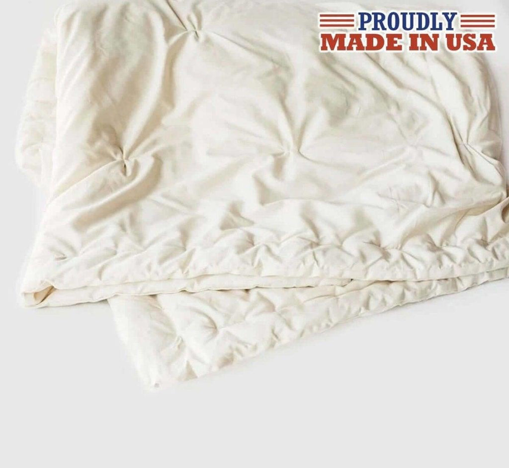 https://www.turmerry.com/cdn/shop/products/made-in-usa-medium-weight-natural-wool-comforter-turmerry-3_1024x1024.jpg?v=1641609965